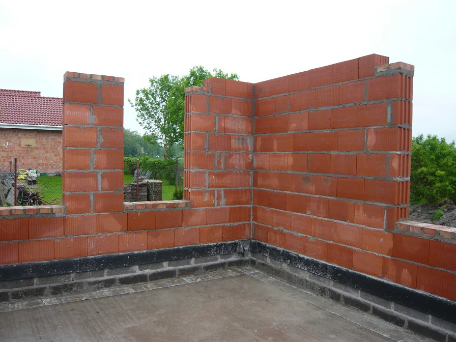 Budowa domu jednorodzinnego, stan surowy, mury, strop żelbetowy