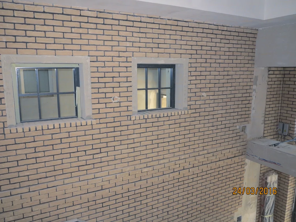 Remont budynku, ściany murowane z cegły 